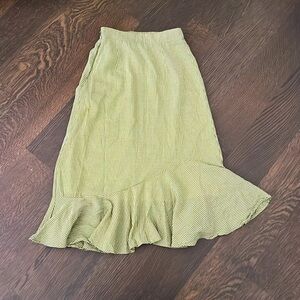 Cute, slightly below the knee length plaid skirt.